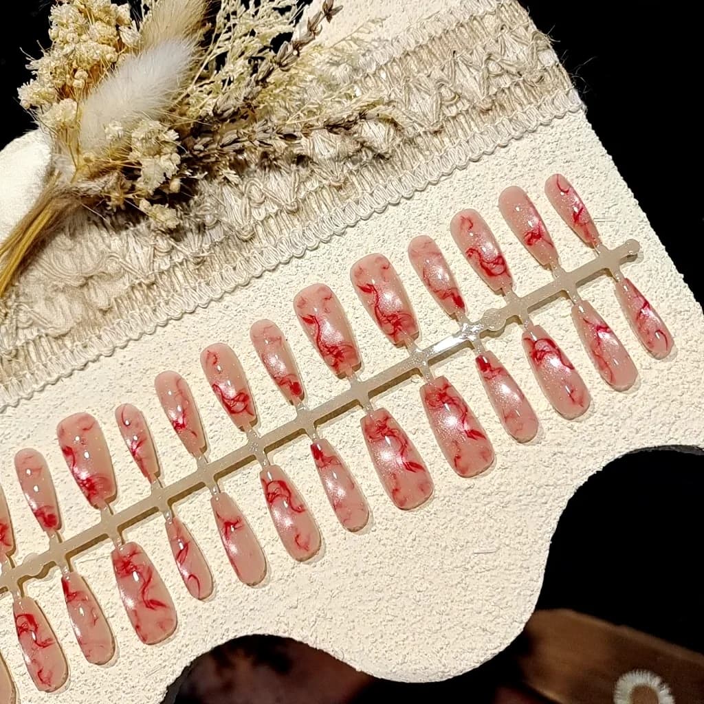 Rózsaszín macskaszem műköröm, közepes ovális forma, csillámos felület