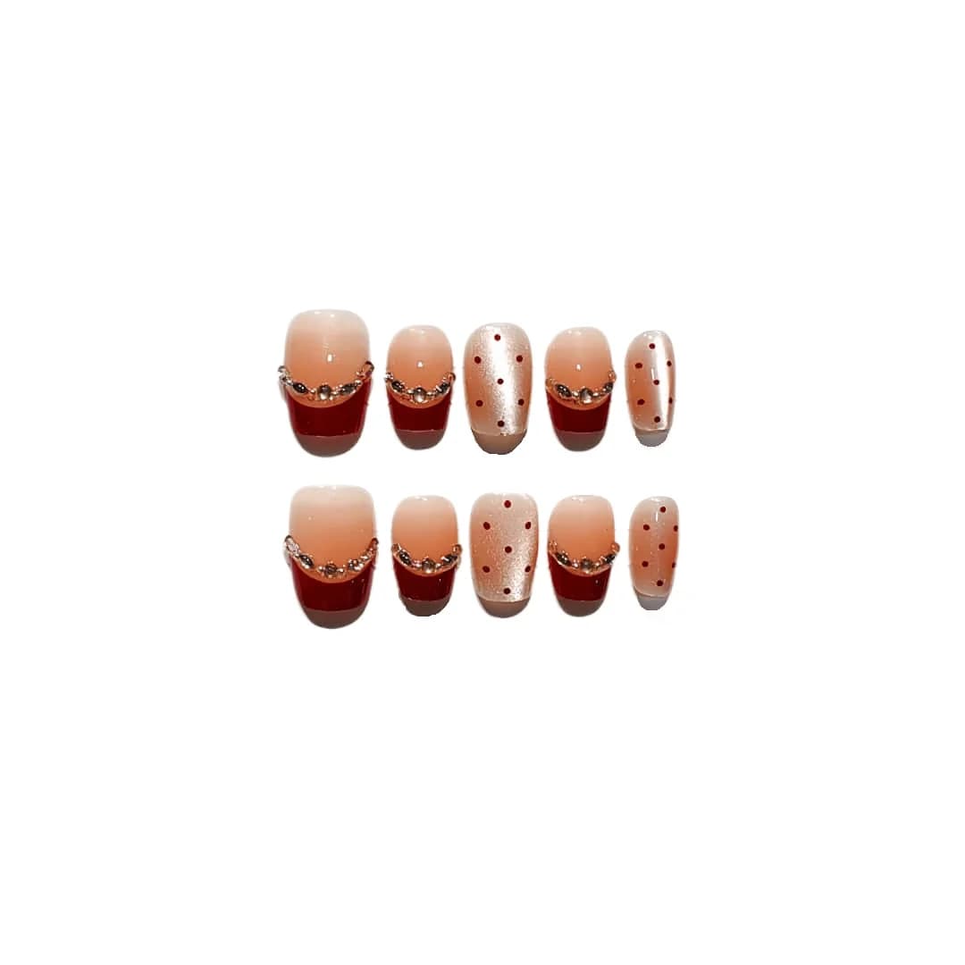 Vörösbarna macskaszem műköröm strasszkövekkel